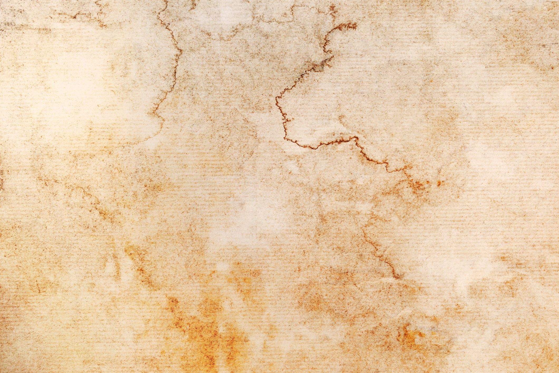 Vintage stained paper texture close-up
