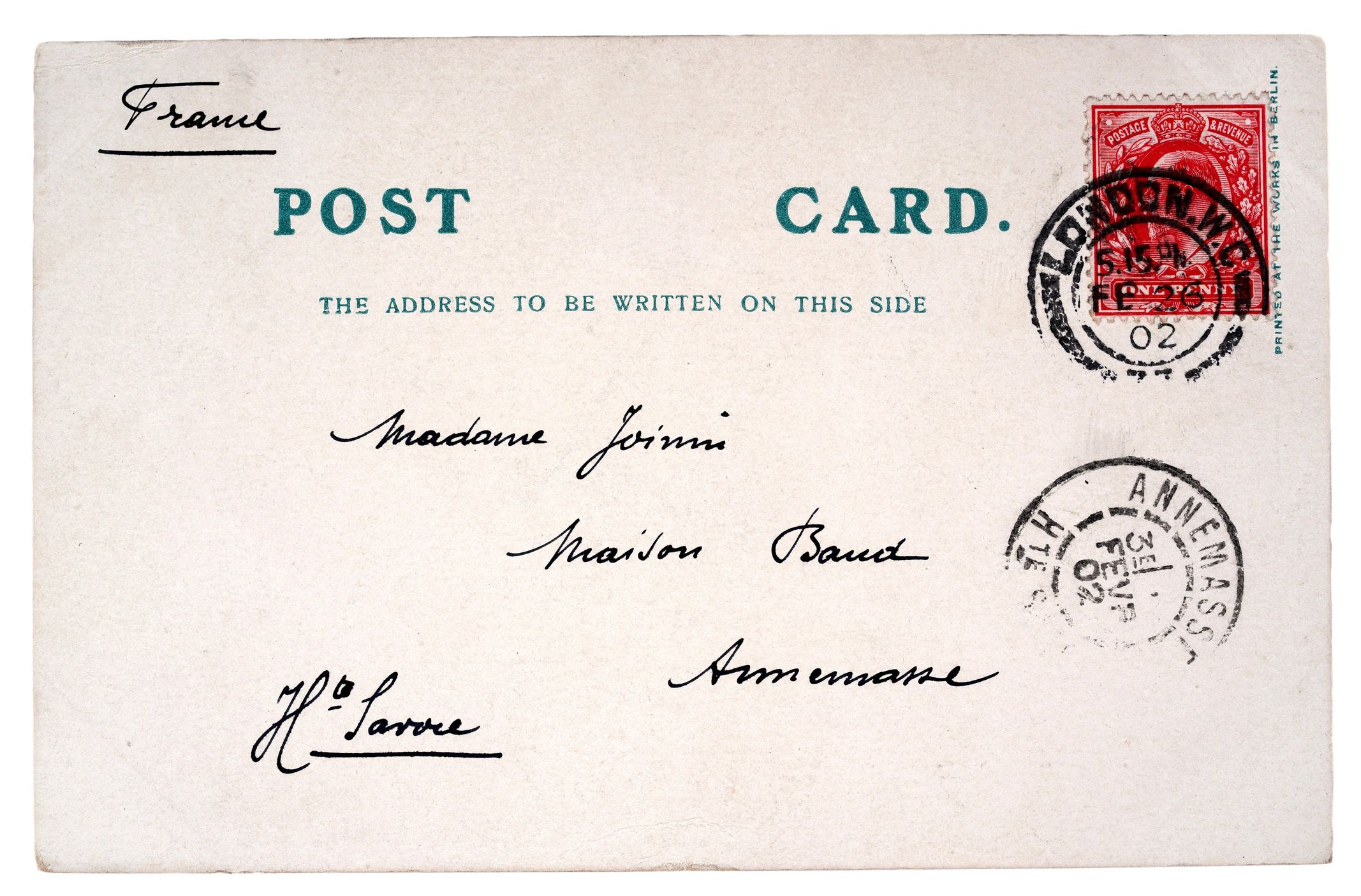 Vintage postcard with handwritten address and stamp